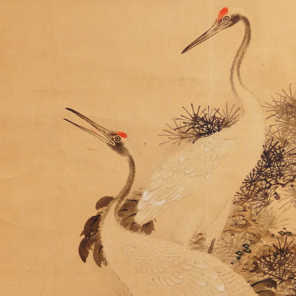 Dos cabezas de grulla en primer plano bajo ramas de pino, kakemono de Murata Toho