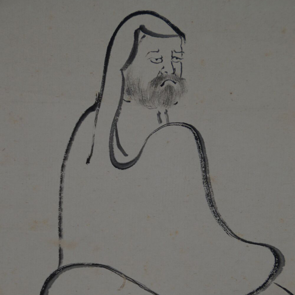 Close-up of the head and upper body of the seated Bodhidharma in the Kakemono Bodhidharma Straight to the Heart